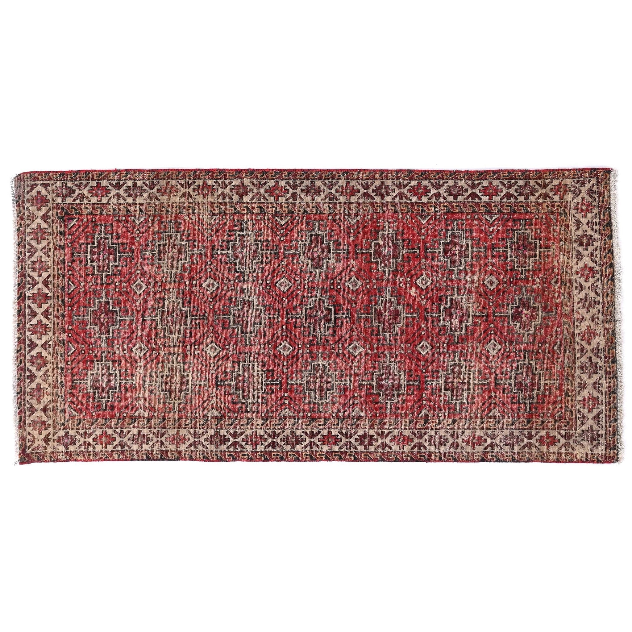 Traditional patterned rug on a white background