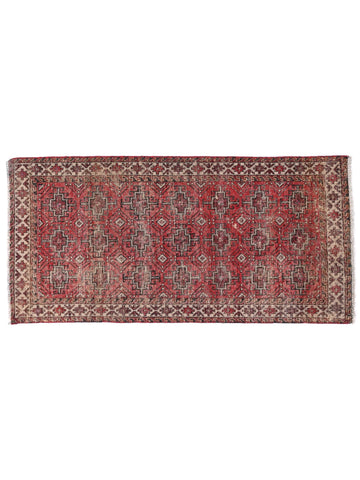 Traditional patterned rug on a white background