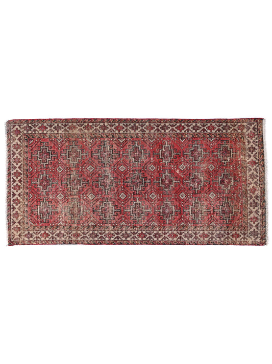 Traditional patterned rug on a white background