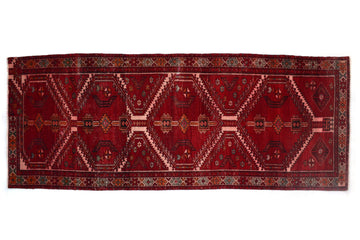 Red patterned rug on a white background