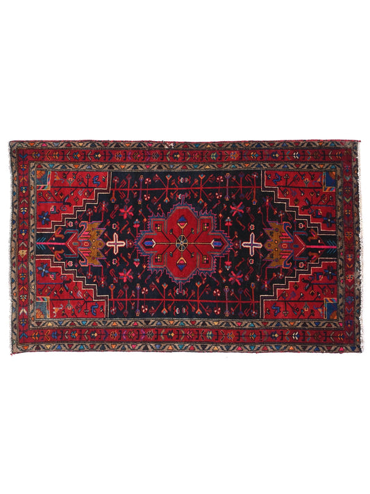 Decorative rug with intricate patterns on a white background