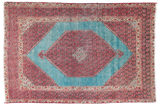 Decorative rug with a geometric pattern on a white background