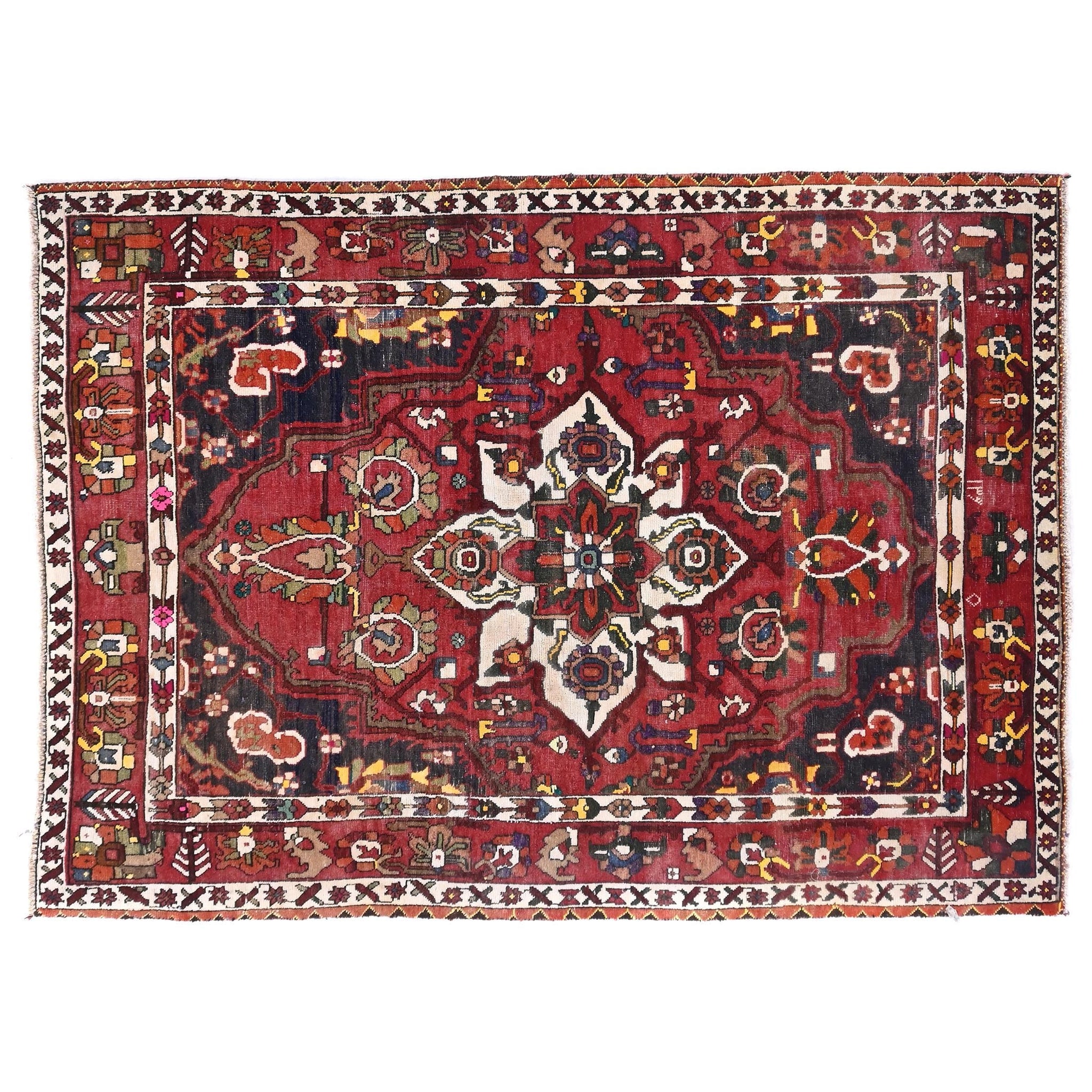 Decorative rug with intricate patterns on a white background