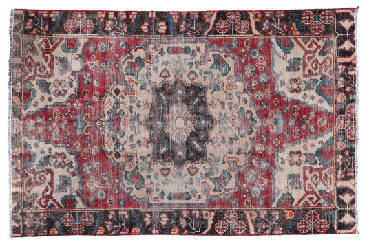 Decorative rug with intricate patterns on a white background
