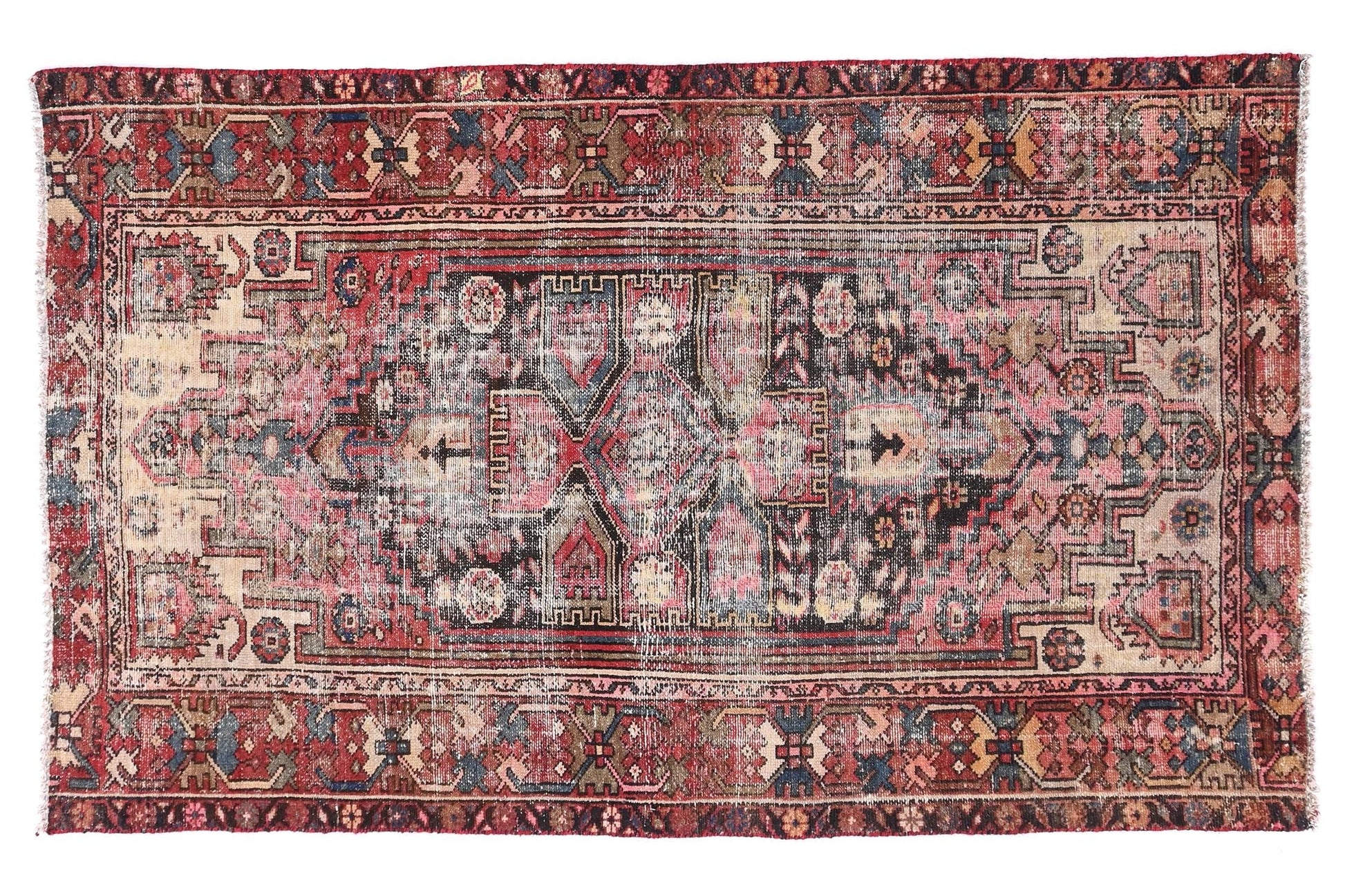 Vintage-style rug with intricate patterns on a white background