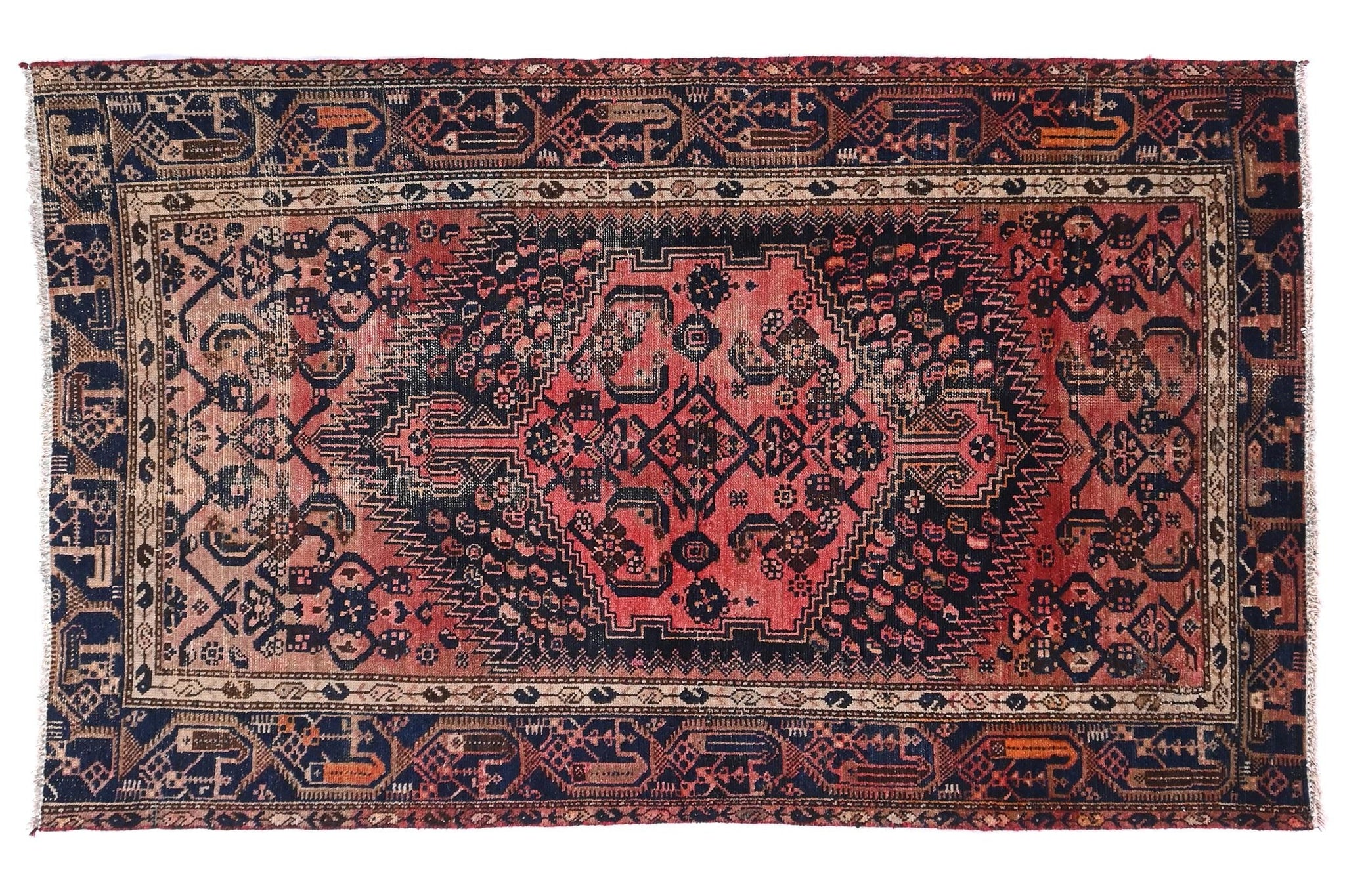 Decorative rug with intricate patterns on a white background