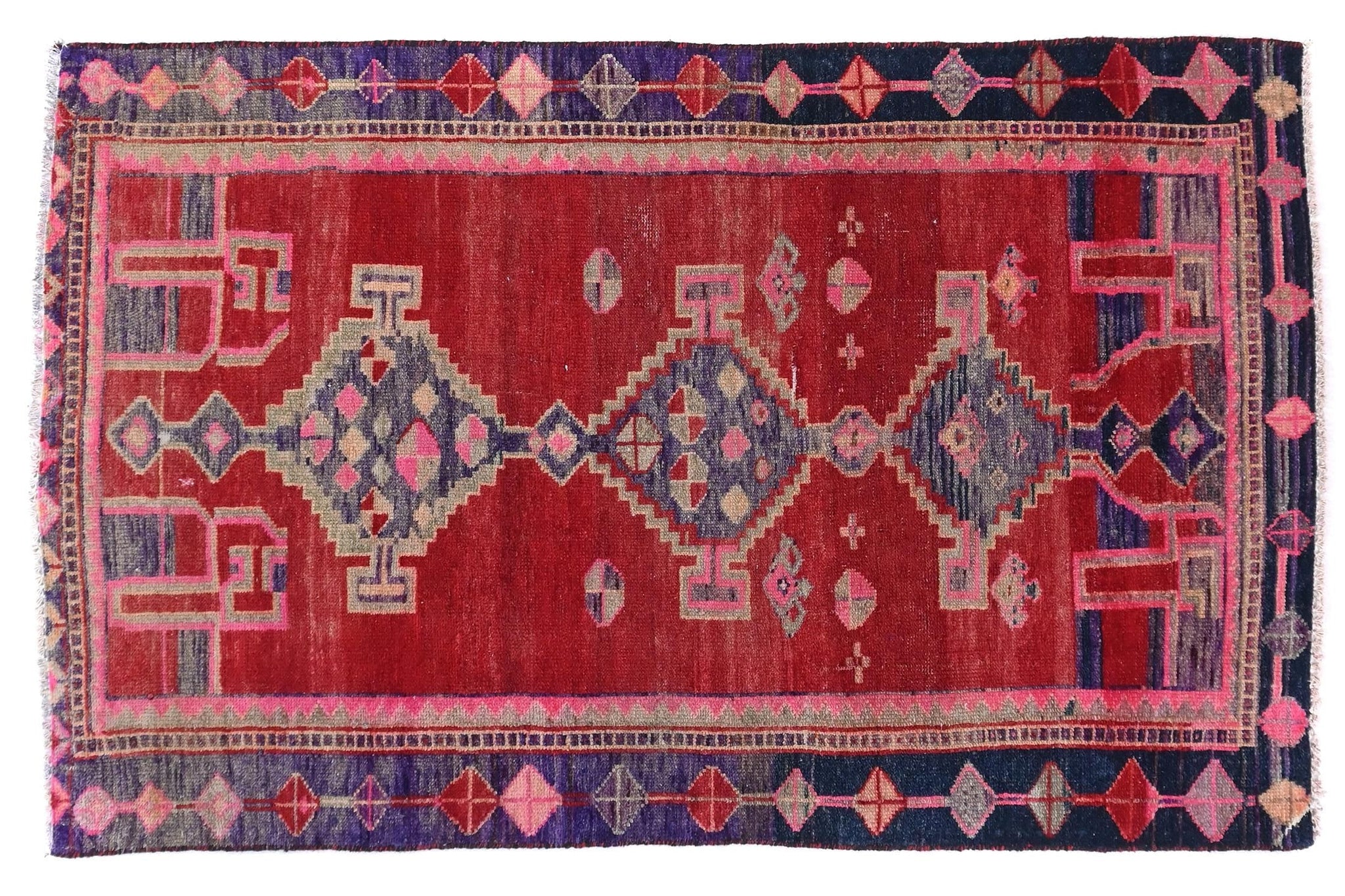 Decorative rug with geometric pattern on a white background