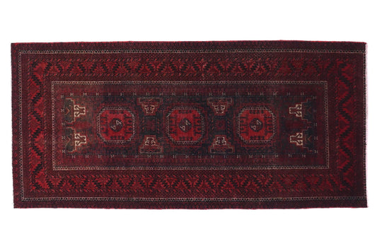 Red patterned rug on a white background