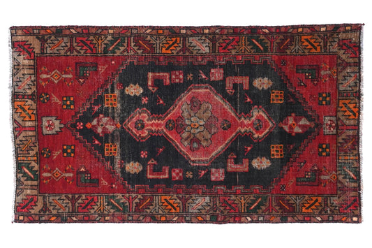 Decorative rug with intricate patterns on a white background