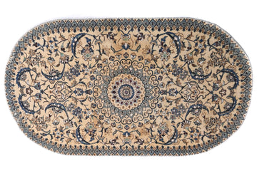 Oval-shaped rug with intricate patterns on a white background