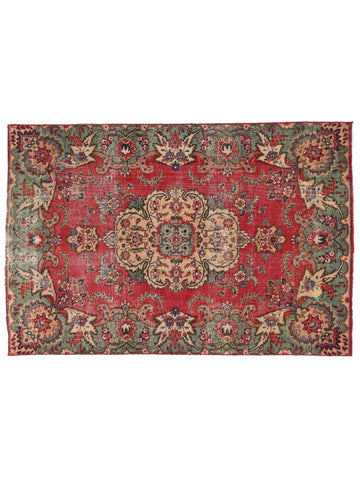 Decorative rug with intricate patterns on a white background