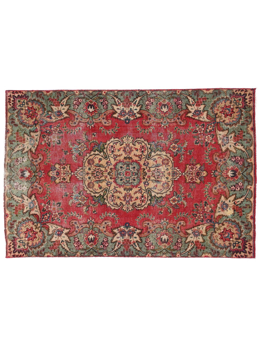 Decorative rug with intricate patterns on a white background