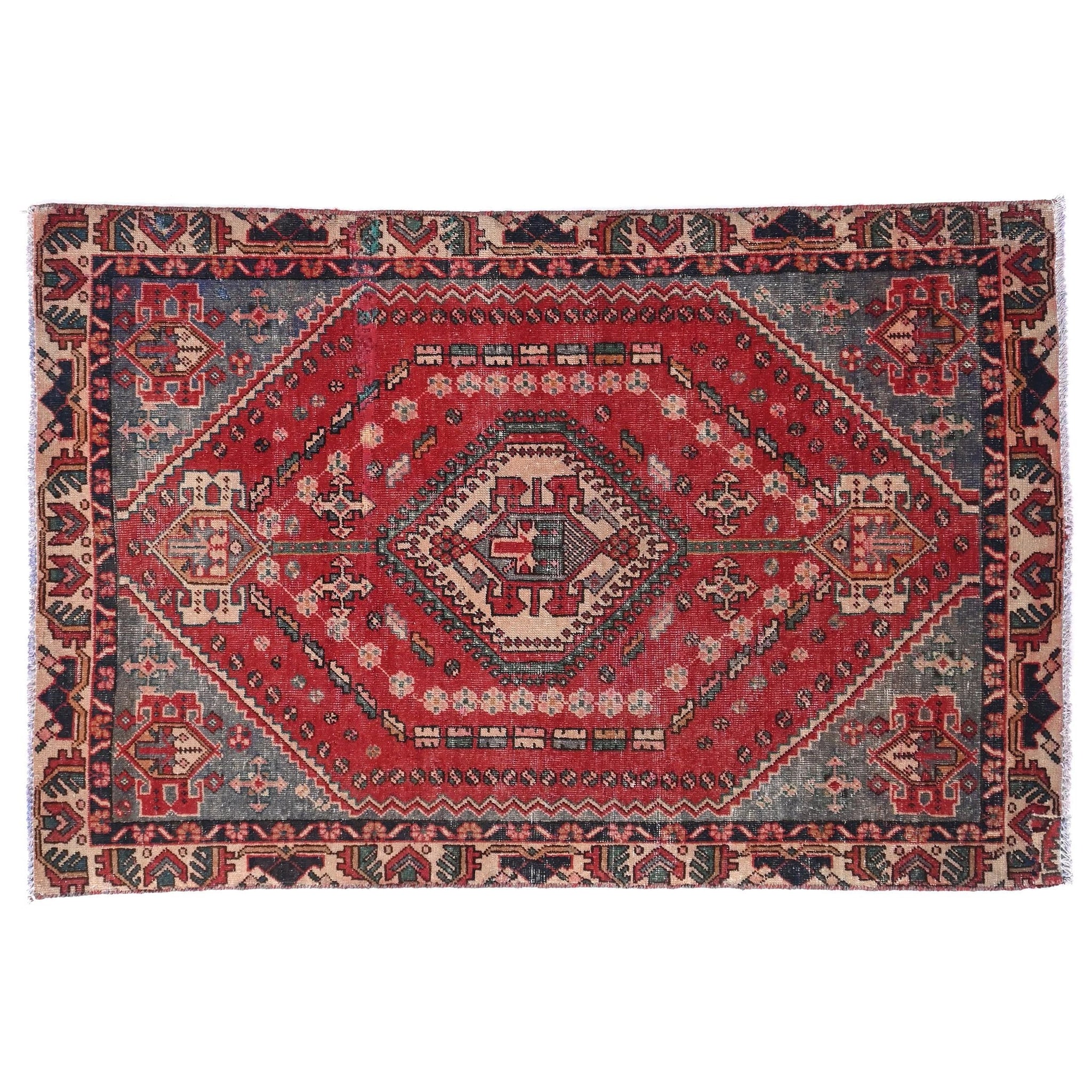 Decorative rug with intricate patterns on a white background