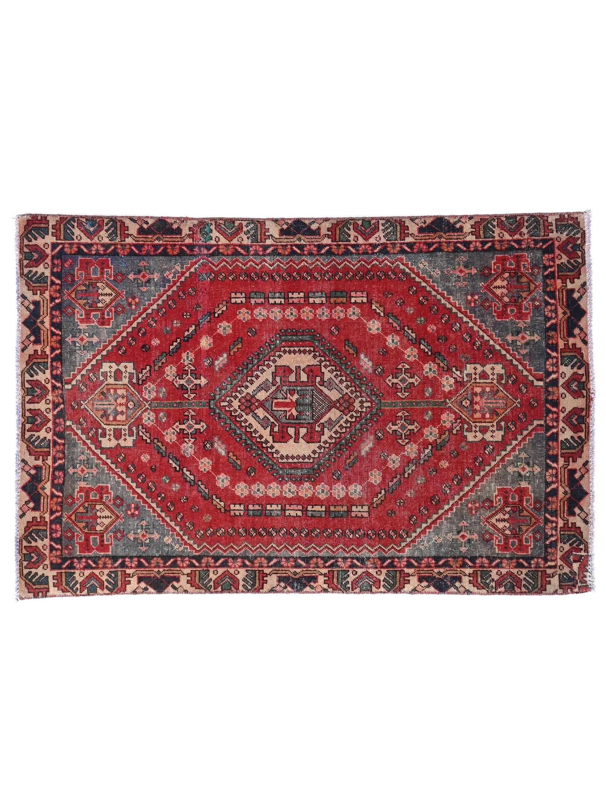 Decorative rug with intricate patterns on a white background