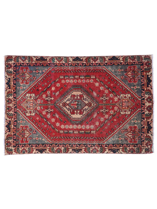 Decorative rug with intricate patterns on a white background