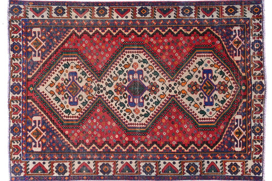 Decorative rug with intricate patterns on a white background