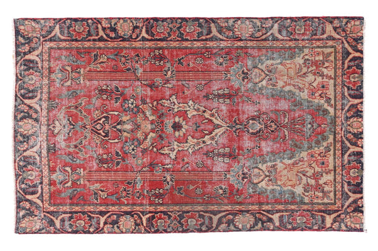 Decorative rug with intricate patterns on a white background