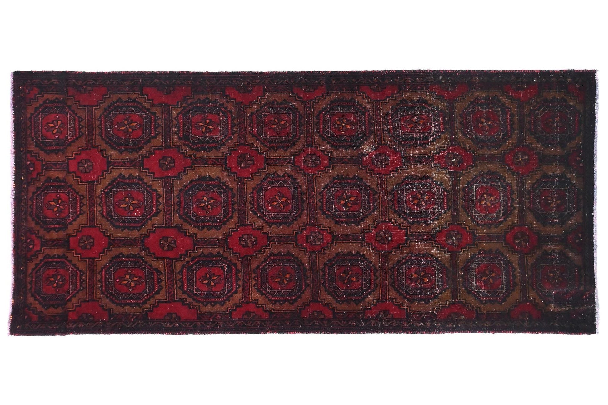 Decorative rug with intricate pattern on a white background
