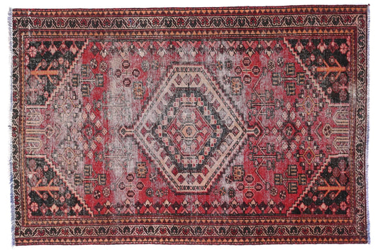 Decorative rug with intricate patterns on a white background