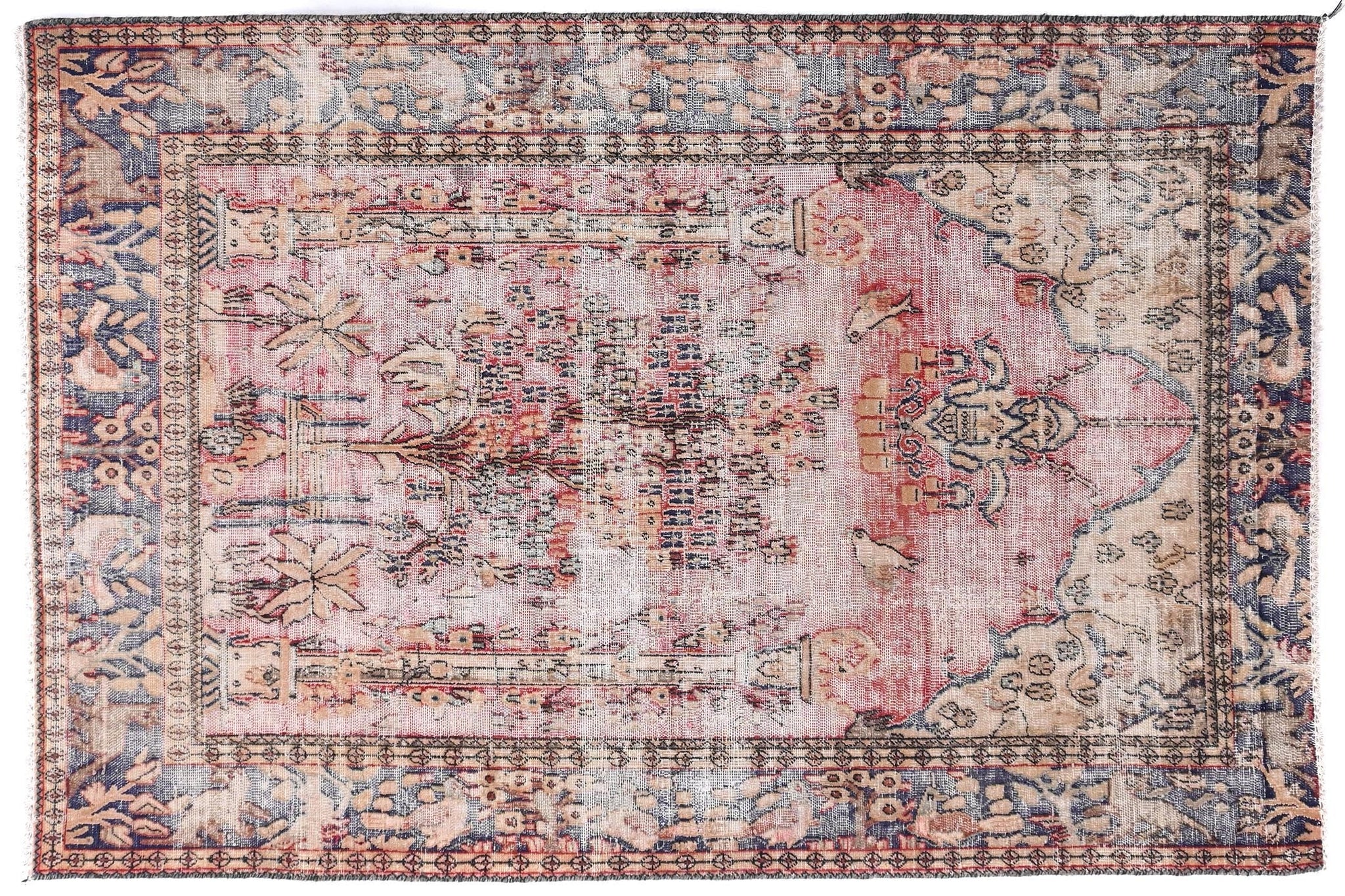 Decorative rug with intricate patterns on a white background