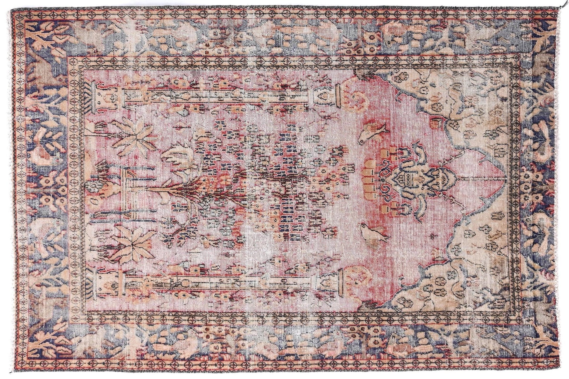 Decorative rug with intricate patterns on a white background