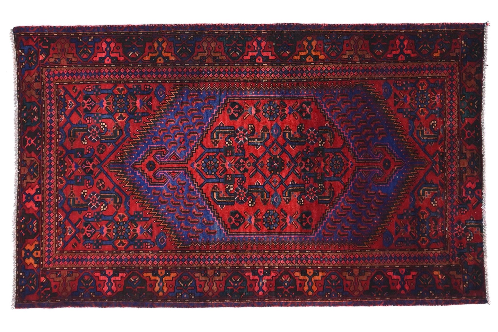 Decorative rug with intricate patterns on a white background