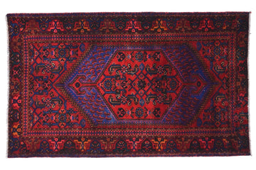 Decorative rug with intricate patterns on a white background