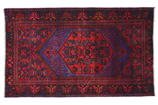 Decorative rug with intricate patterns on a white background