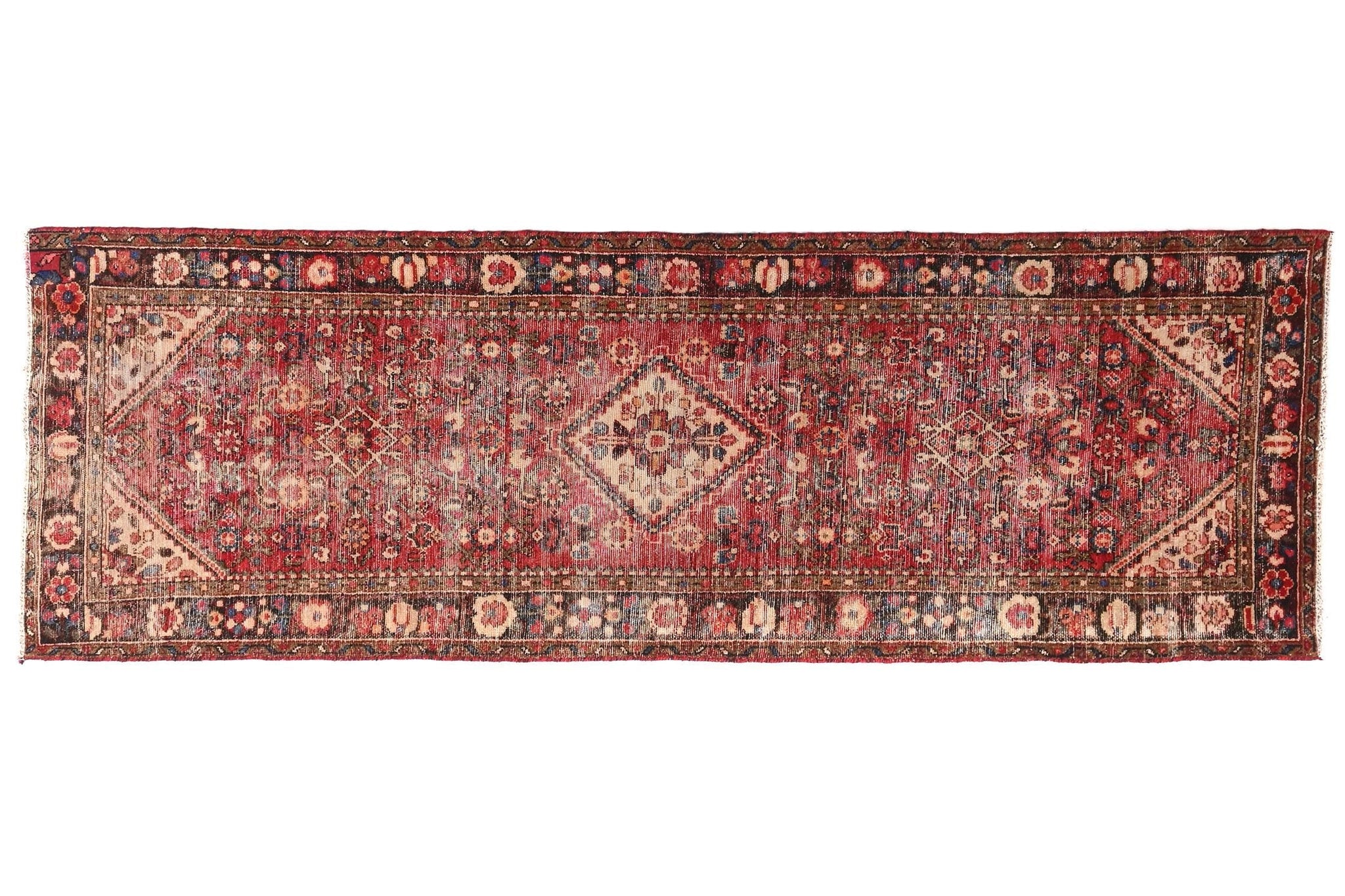 Traditional patterned rug on a white background