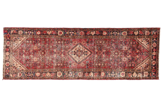 Traditional patterned rug on a white background