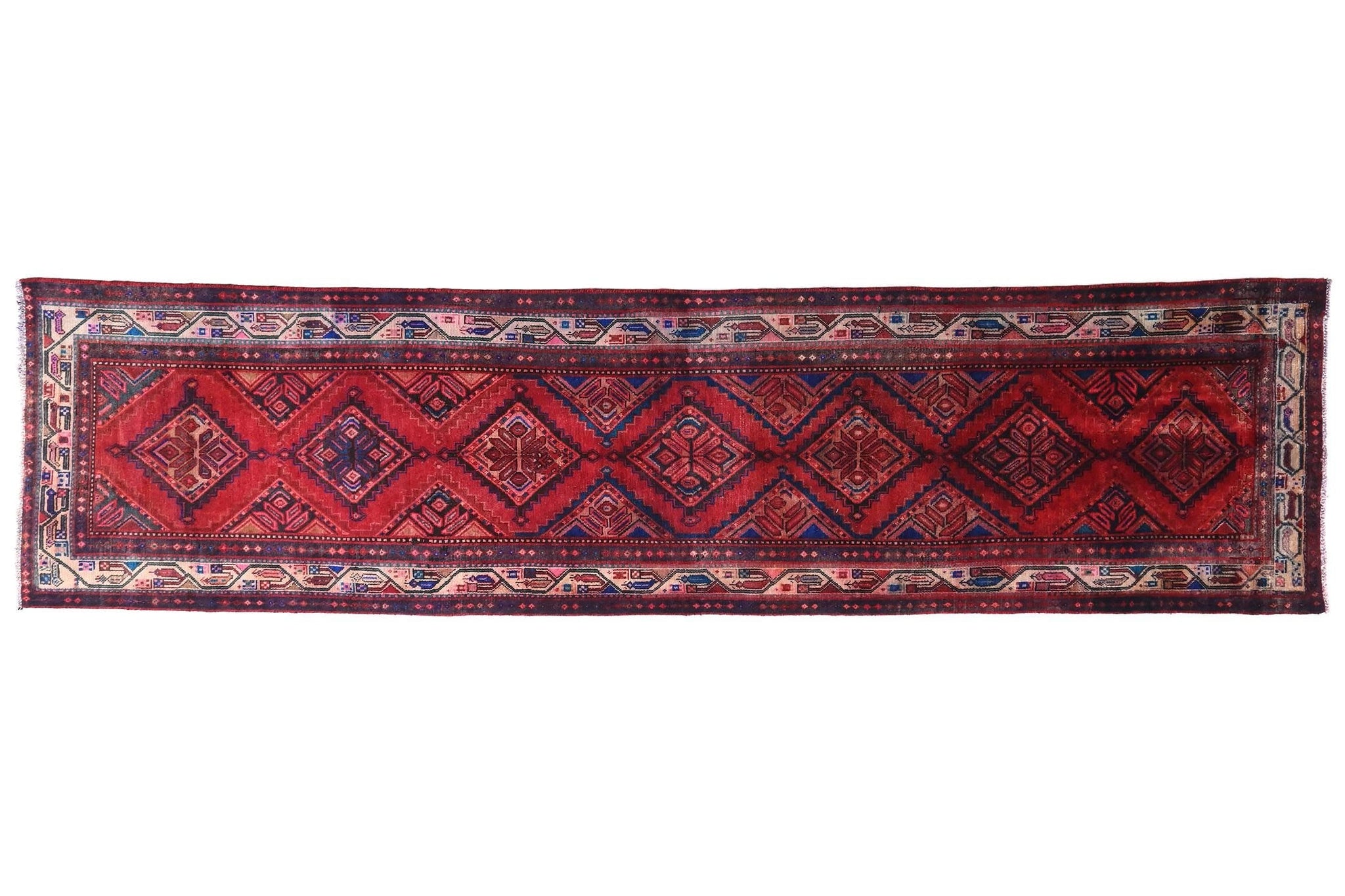 Red patterned rug on a white background