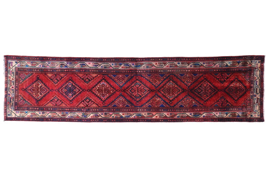 Red patterned rug on a white background