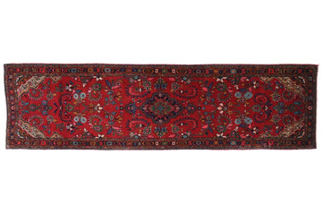 Red patterned rug on a white background