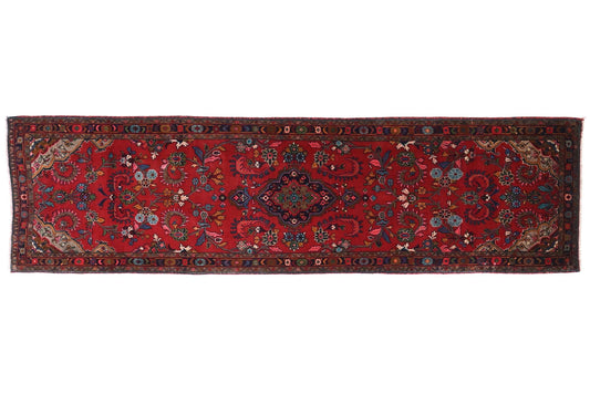 Red patterned rug on a white background