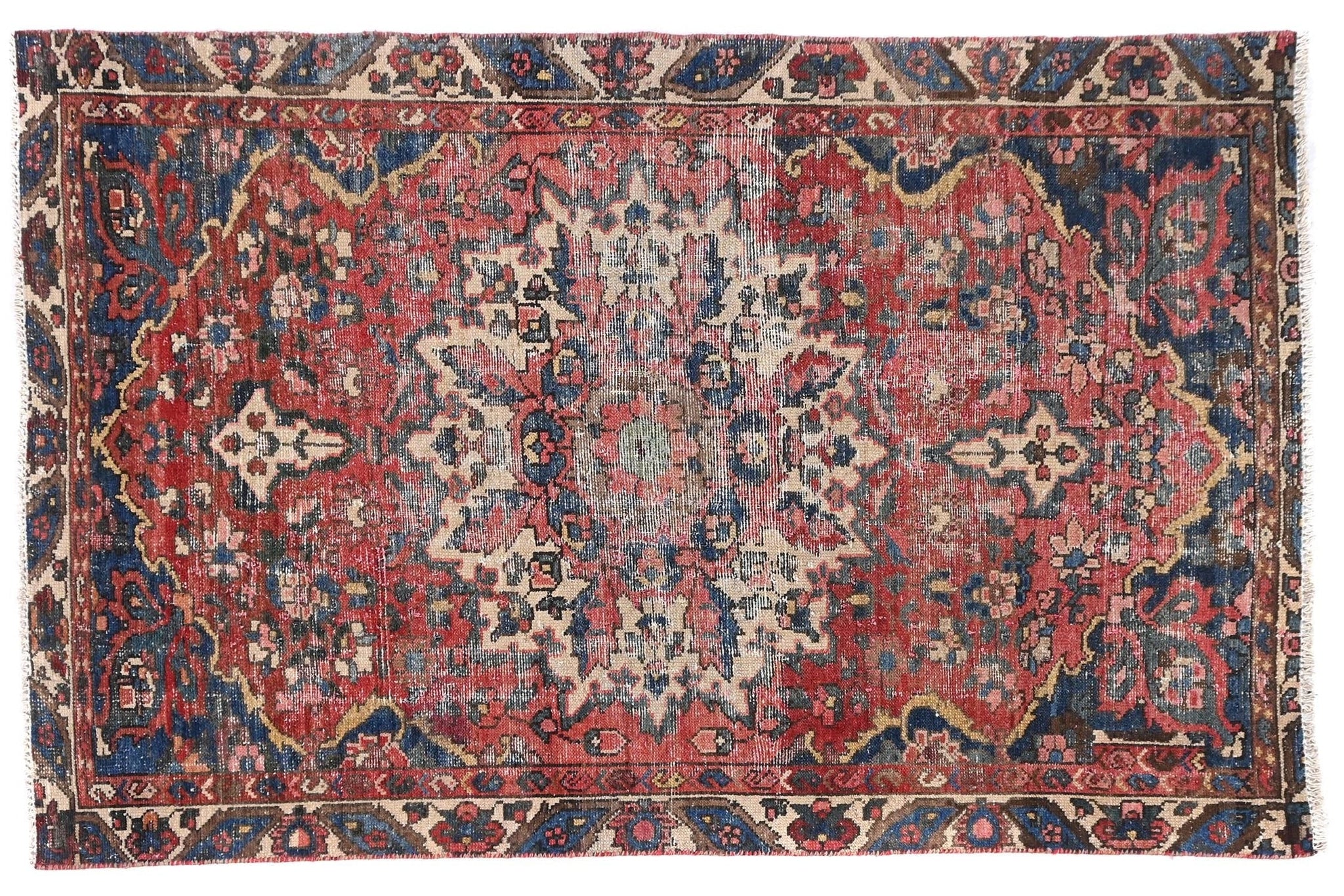 Vintage-patterned rug with intricate design on a white background