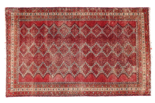Red patterned rug on a white background