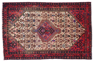 Decorative rug with intricate patterns on a white background