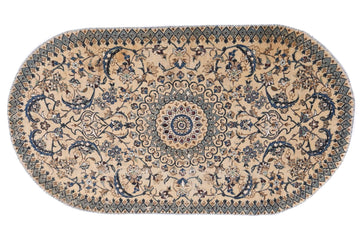 Oval-shaped rug with intricate patterns on a beige background
