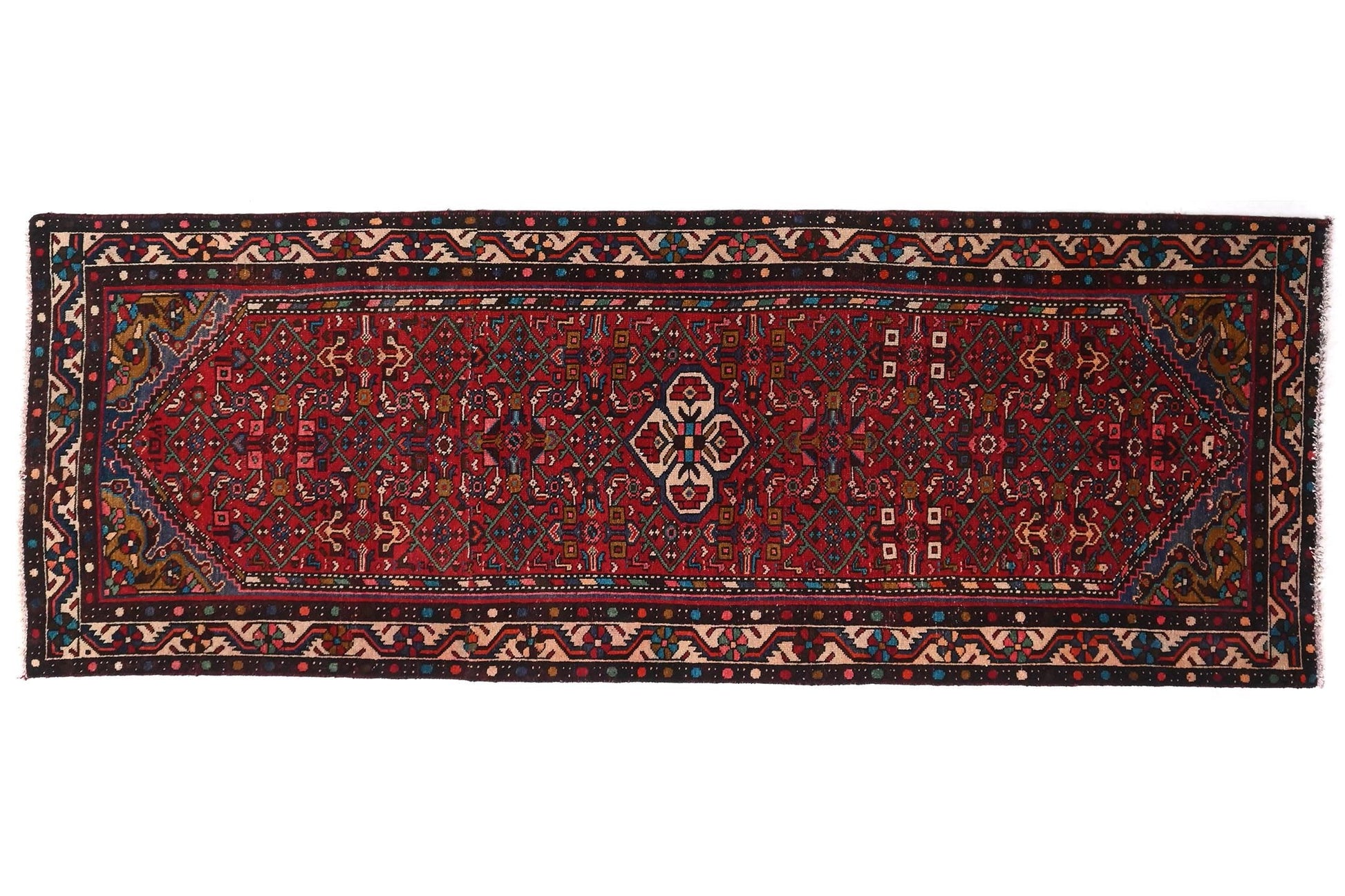 Traditional patterned rug on a white background