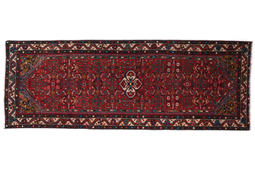 Traditional patterned rug on a white background