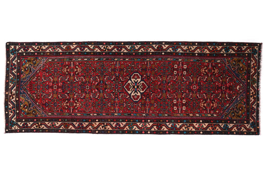 Traditional patterned rug on a white background