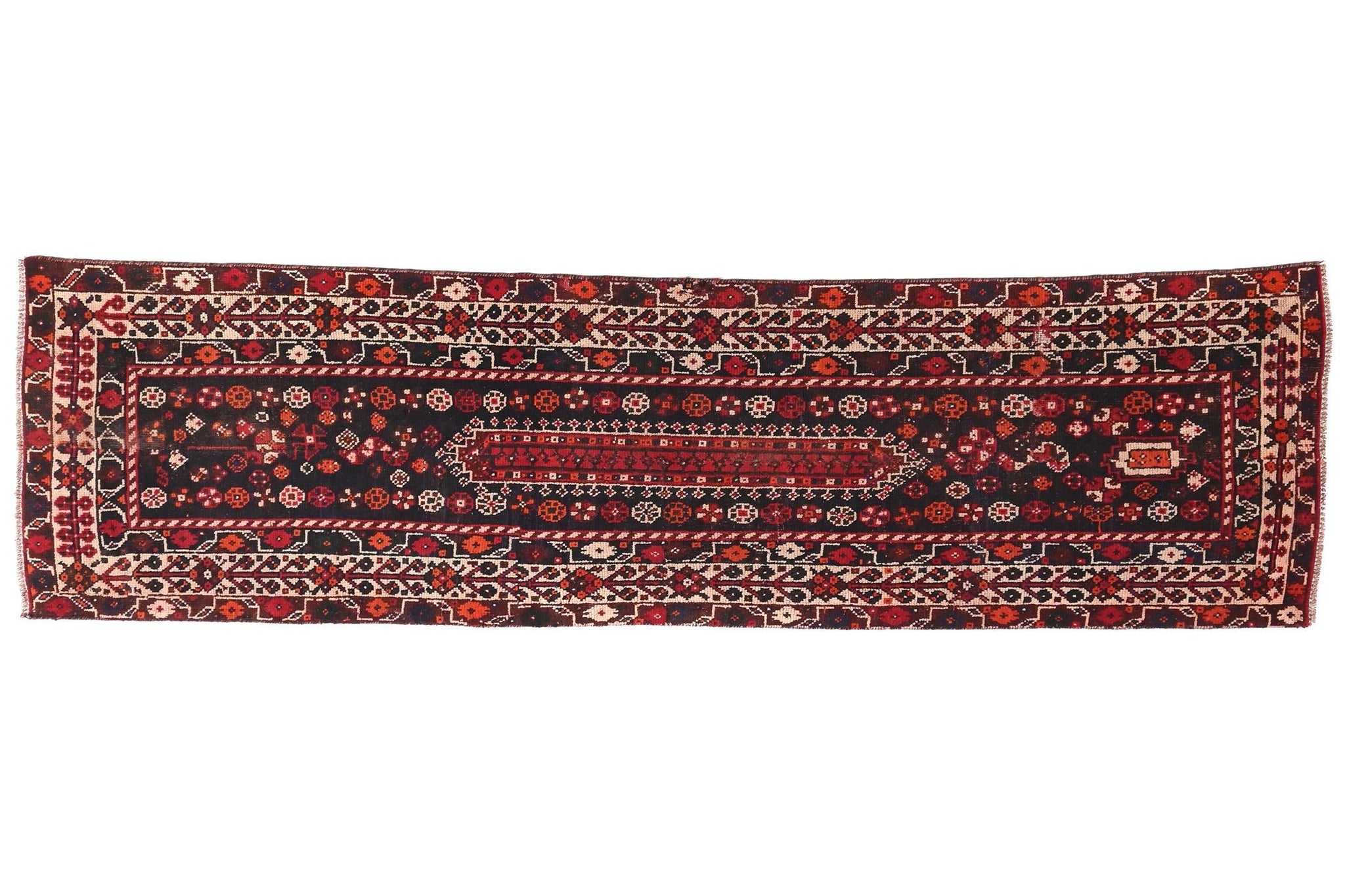 Decorative rug with intricate patterns on a white background