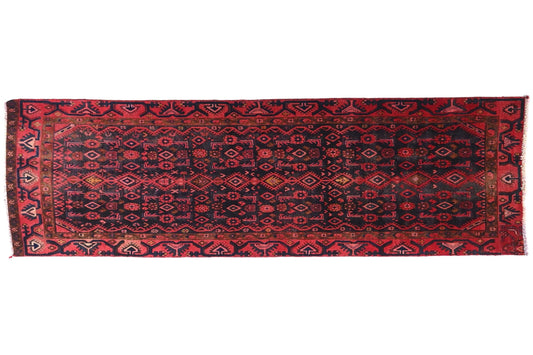 Red patterned rug on a white background